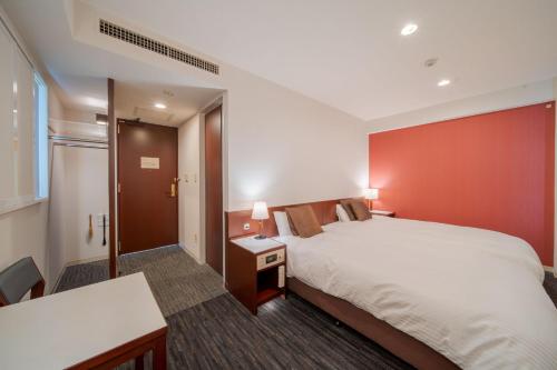 Letto o letti in una camera di Meitetsu Inn Nagoya Ekimae