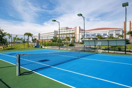 a tennis court in front of a building at The Pearl Hoi An in Hoi An
