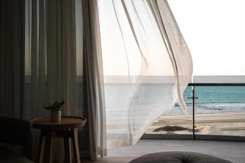  Jumeirah at Saadiyat Island Resort -  Room  picture :   Tea/Coffee maker    Minibar    Shower                           