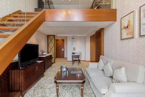 TV a/nebo společenská místnost v ubytování Best Western Premier Hotel Hefei