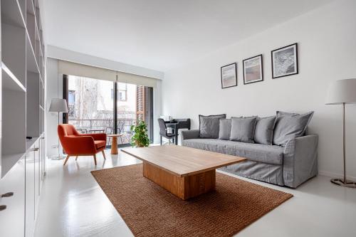 a living room with a couch and a coffee table at NOA - Ali Hoca 6 in Istanbul