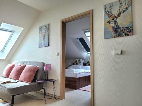 A bed or beds in a room at Silver Lodge Vendégház Egerszalók