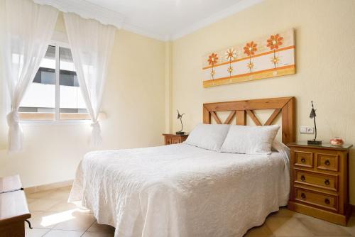 Posteľ alebo postele v izbe v ubytovaní Apartamento El Tajo