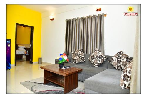 Posezení v ubytování Rosary Meadows 1 BHK Studio Apartment Manyata Tech Park