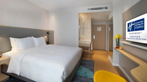 Postel nebo postele na pokoji v ubytování Holiday Inn Express Chengdu Tianfu Airport Zone by IHG