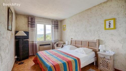 Postel nebo postele na pokoji v ubytování Villa de rêve à Rayol-Canadel-sur-Mer