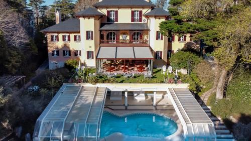 an aerial view of a house with a swimming pool at Sintra Marmoris Palace in Sintra