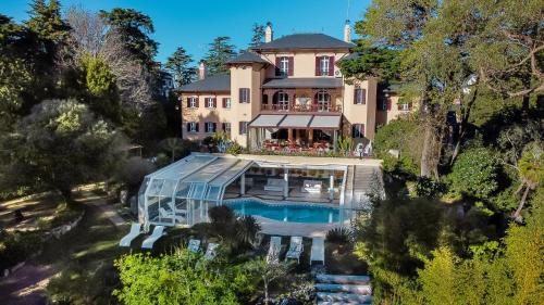 an aerial view of a house with a swimming pool at Sintra Marmoris Palace in Sintra