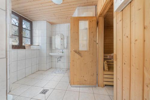 a bathroom with a shower and a toilet and a sink at Schloss Berg Klösterle in Zedlitzdorf
