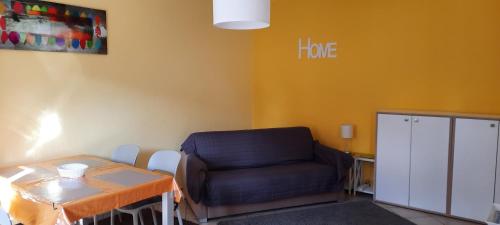 Posezení v ubytování Ferienwohnung GALLO mit überdachter Terrasse Parkplatz 100 mtr z Strand