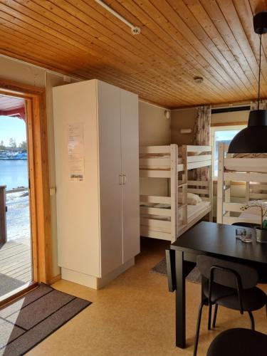 Postel nebo postele na pokoji v ubytování Måvikens Camping