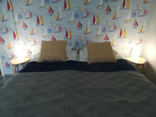 Säng eller sängar i ett rum på Savonlinna Rentals