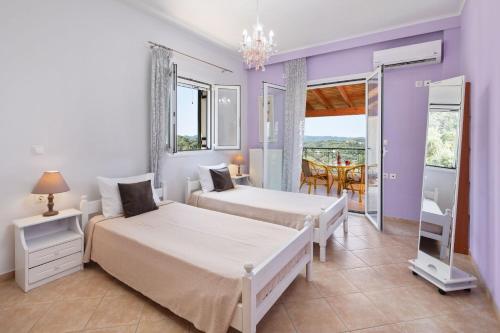 Postel nebo postele na pokoji v ubytování Sunset House