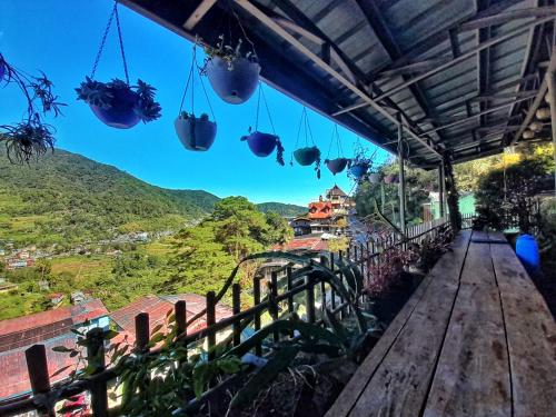 a view from the roof of a house with a view at Banaue Pink Eco hostel in Banaue
