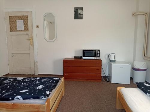 Fotografie z fotogalerie ubytování Štolcova room v destinaci Komárov