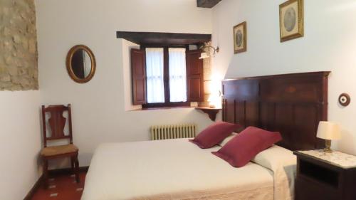Postel nebo postele na pokoji v ubytování La Bodega de Casona de Linares