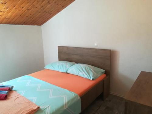 Katil atau katil-katil dalam bilik di Apartmani Radić Rg