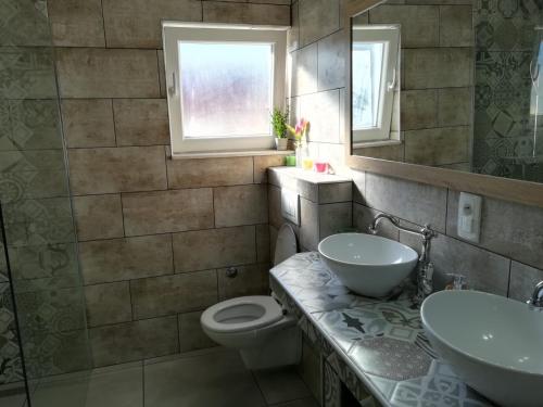 Bilik mandi di Apartmani Radić Rg