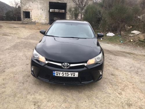 a black car parked in front of a building at House in Mtskheta in Mtskheta