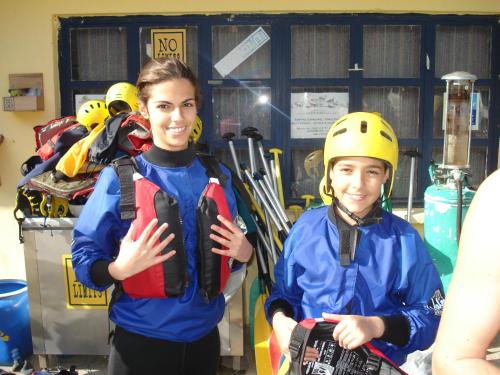 two girls in a room with ski gear at Hotel Spiridoula in Kleidonia