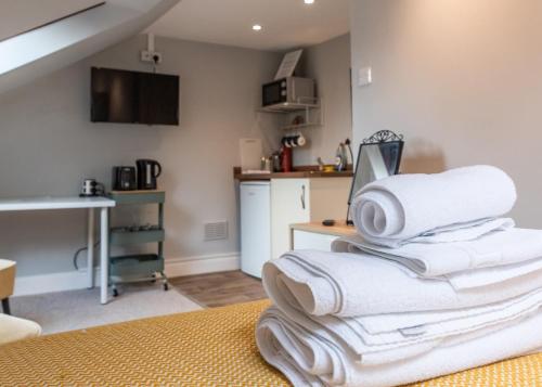 Postel nebo postele na pokoji v ubytování Union Street Suites
