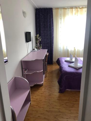 Ένα ή περισσότερα κρεβάτια σε δωμάτιο στο Hotel Parc