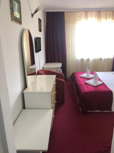 Ένα ή περισσότερα κρεβάτια σε δωμάτιο στο Hotel Parc