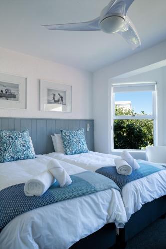 Ένα ή περισσότερα κρεβάτια σε δωμάτιο στο Cape Agulhas Guest House