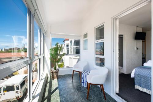 Ένα ή περισσότερα κρεβάτια σε δωμάτιο στο Cape Agulhas Guest House