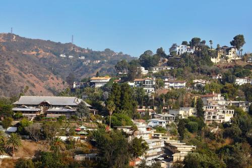 a town on a hill with houses and trees at Loews Hollywood Hotel in Los Angeles
