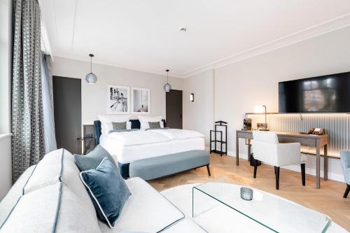 Voodi või voodid majutusasutuse Clounys Hotel toas