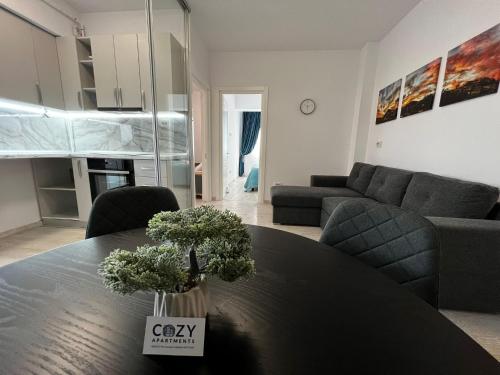 Cozy Apartments - City Center tesisinde bir oturma alanı