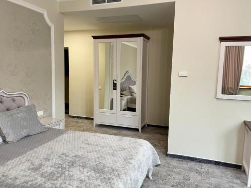 Letto o letti in una camera di Villa ACAEM