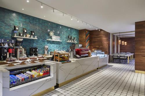 a bakery with a counter in a store at Loews Miami Beach Hotel in Miami Beach
