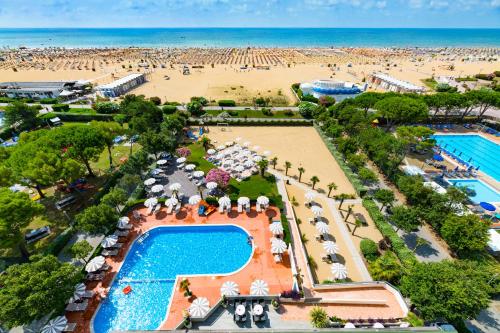 an aerial view of a resort with a beach at Hotel Italy in Bibione