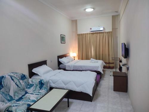 Katil atau katil-katil dalam bilik di Sofea Inn Bukit Merah - Laketown D6529