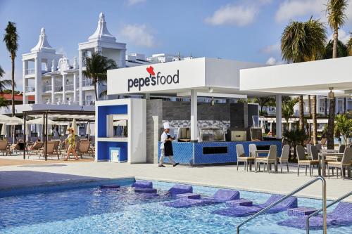 a rendering of a resort with a swimming pool at Riu Palace Riviera Maya - All Inclusive in Playa del Carmen
