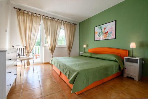 Postel nebo postele na pokoji v ubytování Apartments Kate