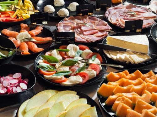 a bunch of different types of food on a table at MABI City Centre in Maastricht