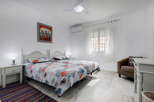 Ένα ή περισσότερα κρεβάτια σε δωμάτιο στο Los Flamencos Manilva apartment