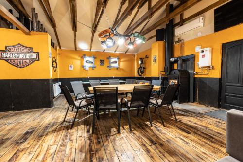 a dining room with a table and chairs at Keletiparty in Hajdúszoboszló