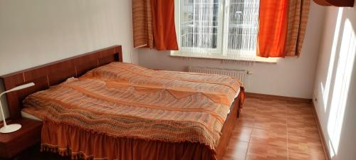 Ліжко або ліжка в номері Zawsze słoneczny apartament Grzybowo