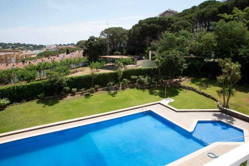 Výhled na bazén z ubytování Caleta Sol 303 Apartamento con piscina comunitaria nebo okolí