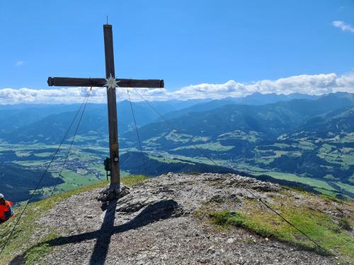 a cross on the top of a mountain at Appartement am Hauser Kaibling in Haus im Ennstal