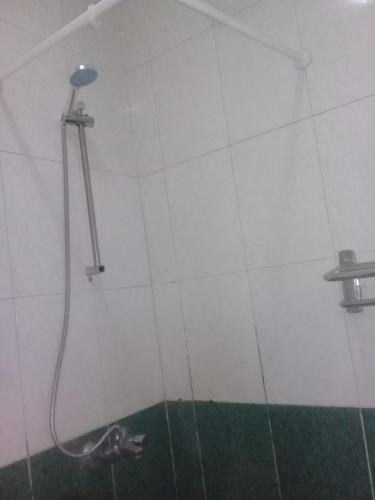 a shower in a bathroom with a shower head at Flat for rent in Sharm El Sheikh