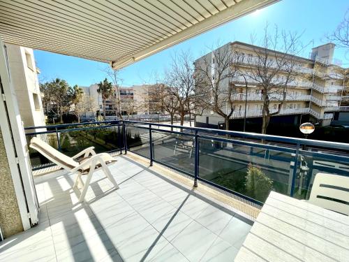 a balcony with a view of a building at Maria Voramar in Cambrils