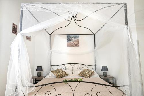 Postel nebo postele na pokoji v ubytování B & B Agrigento antica