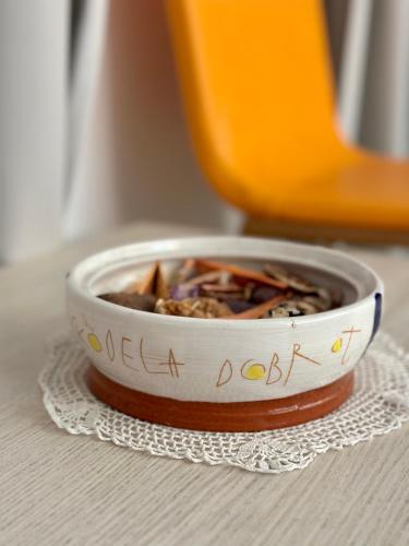 a bowl of food sitting on a napkin at VENEZIANA Boutique Hotel Superior in Koper