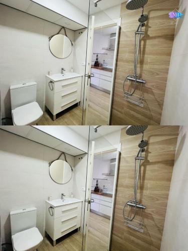 un baño con lavabo y espejo en Apartamento Peñon de Ifach, en Calpe