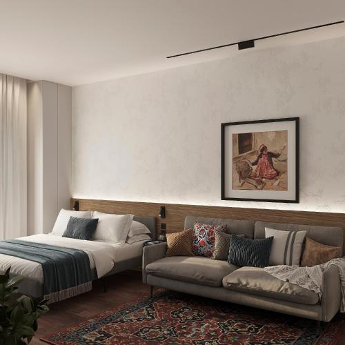 a bedroom with a bed and a couch at Blueloft 47 l studio with balcony Tashkent City Center in Tashkent